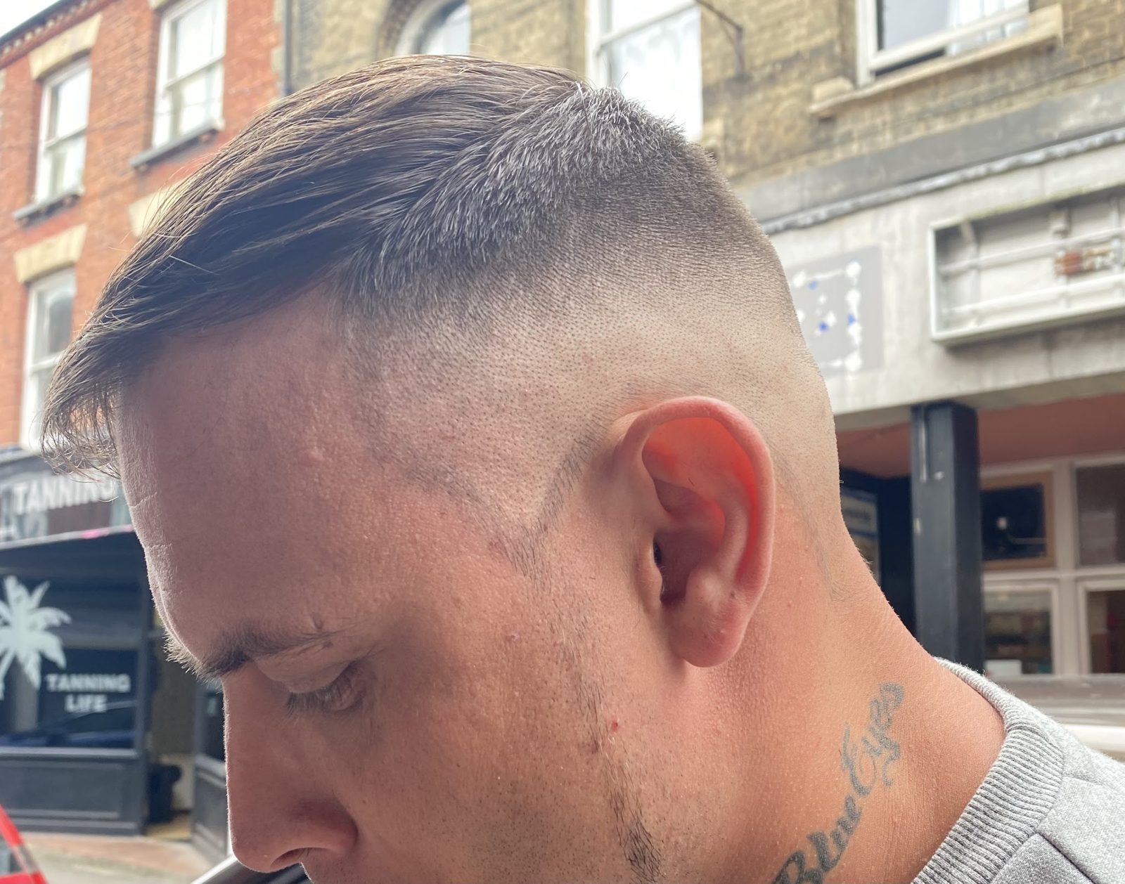 A skin fade, side profile