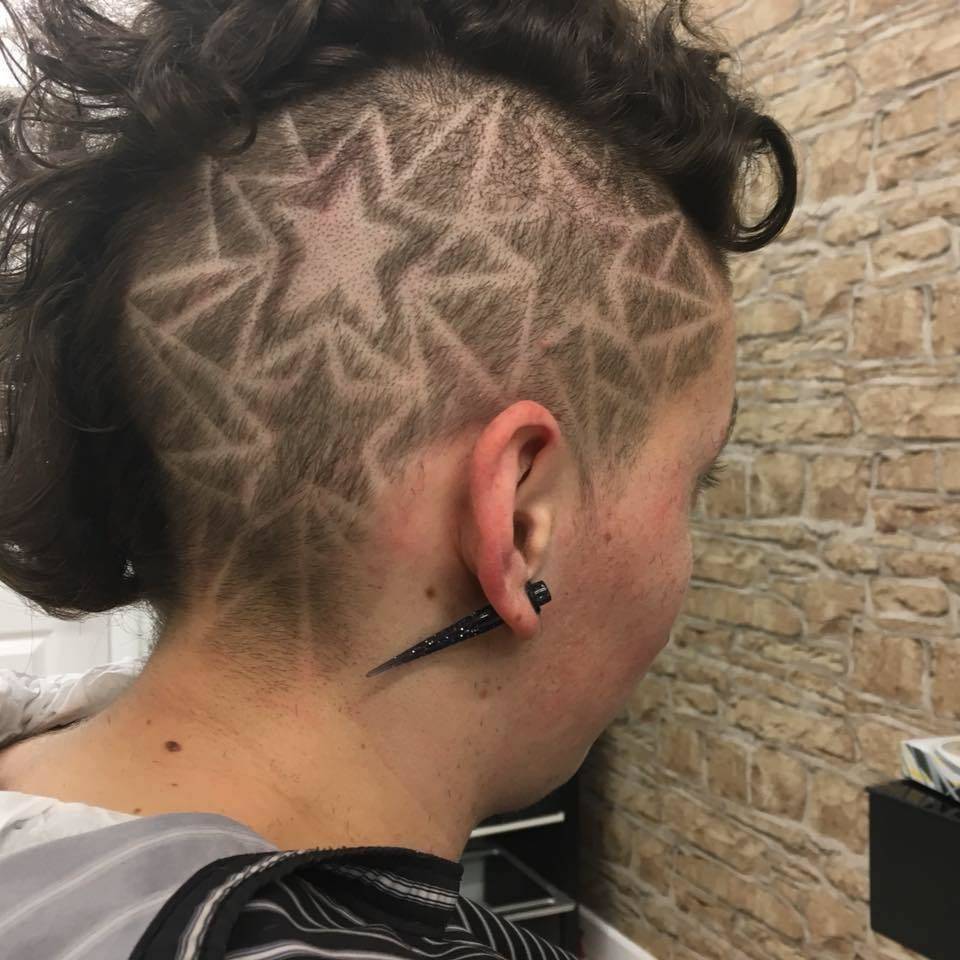 A star pattern shaved into the side of the head